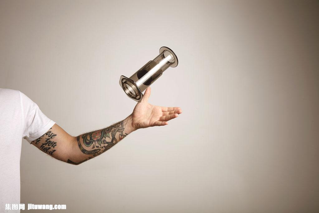 Hipster in white t-shirt holding aeropress (10)